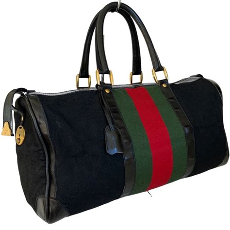 keepall gucci|Gucci leather duffle bag.